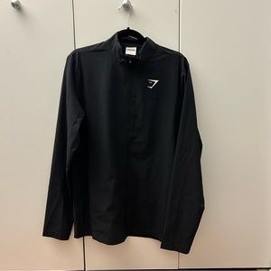 Gymshark Black Windbreaker. Lightweight and great for running and activity.